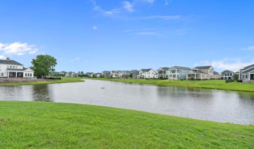 Water view featuring nearby suburban area