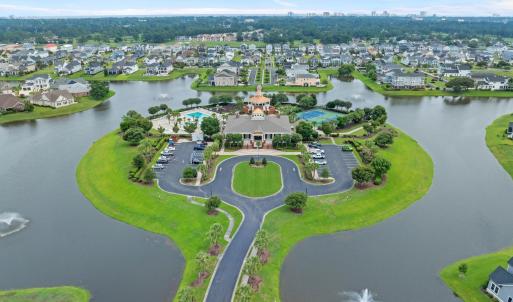 Aerial perspective of suburban area with a nearby