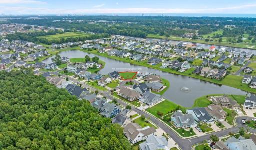 Aerial view of property's location with a nearby b