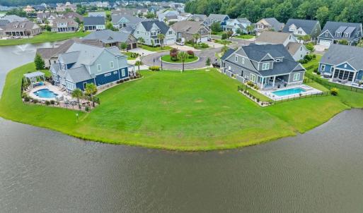 Aerial perspective of suburban area with a pool ar