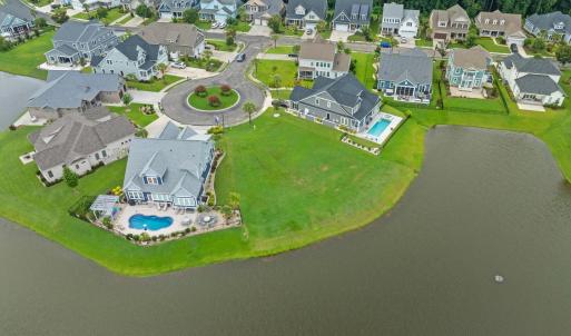 Aerial perspective of suburban area featuring a po