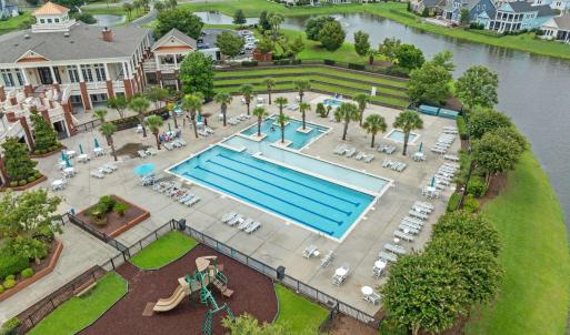 View of swimming pool featuring a water view and a
