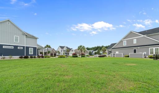 View of grassy yard featuring a residential view