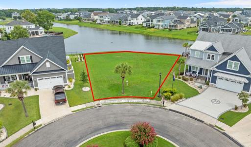 Aerial perspective of suburban area with a nearby