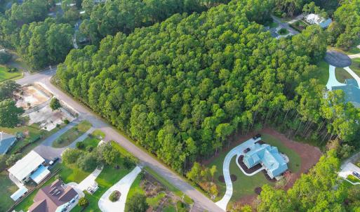 View of property location with a forest