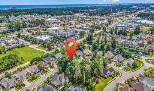View of property location with a nearby body of wa