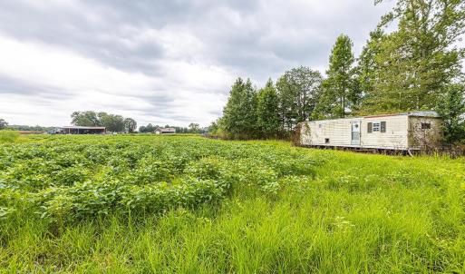 View of yard with a rural view