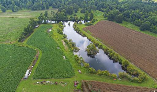 Aerial view of property and surrounding area with