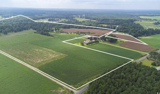 View of rural area with large plots for crops and