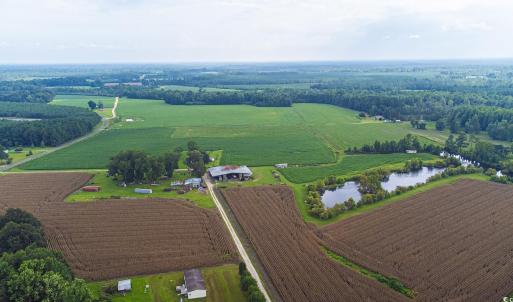 Aerial view of sparsely populated area with extens