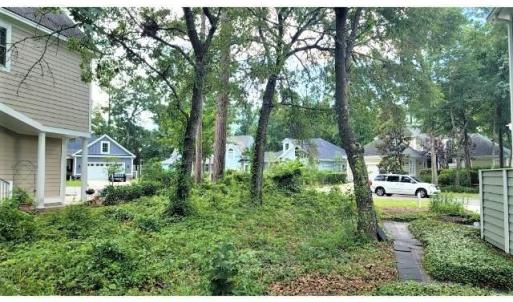 View of yard with view of scattered trees