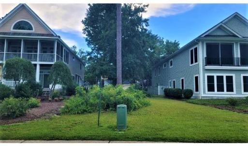 View of property's community featuring a sunroom a