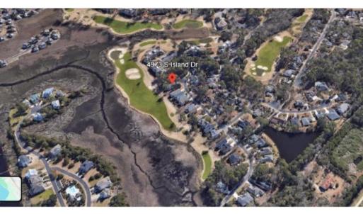 Aerial view of property's location featuring a gol