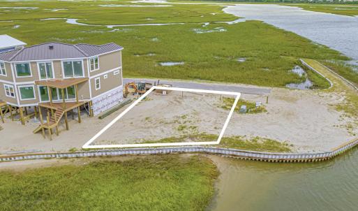 Aerial view of property and surrounding area with