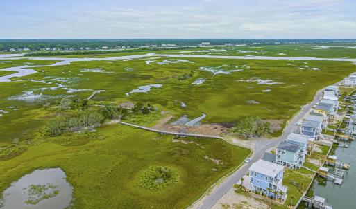Aerial perspective of suburban area with a nearby