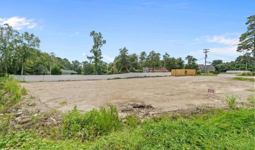 Surrounding community featuring view of wooded are