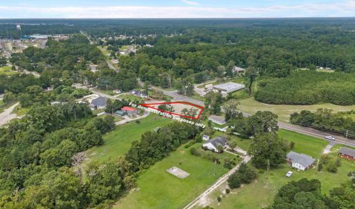 Aerial view of property's location featuring prope