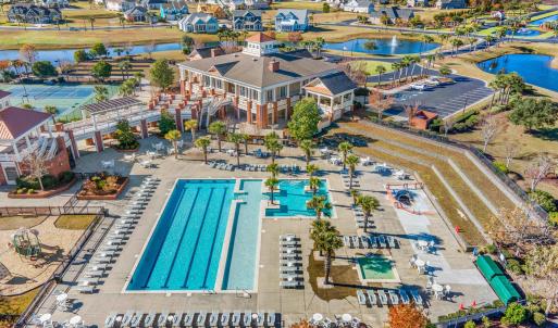 Bird's eye view of a pool and a large body of wate