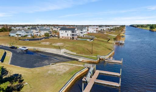 Aerial view of residential area with a large body
