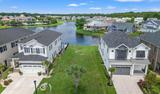 Aerial perspective of suburban area with a nearby