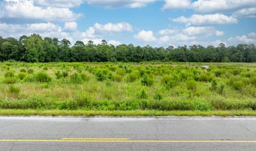 View of asphalt road with a view of countryside