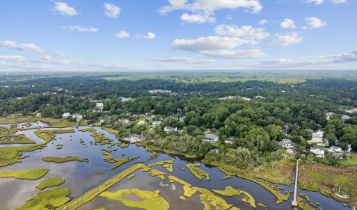 Aerial view of a large body of water and a forest