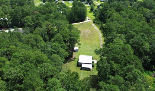 View of property location with a forest