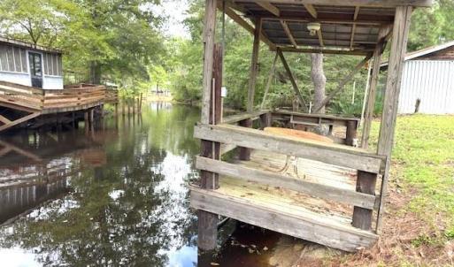 Dock featuring a water view