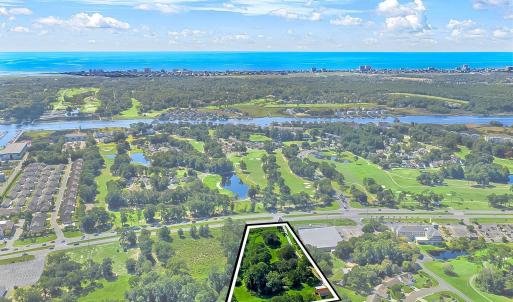 Aerial view of property's location featuring prope