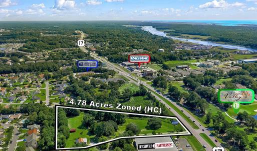 Aerial view of property's location featuring prope