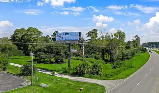View of home's community featuring view of wooded
