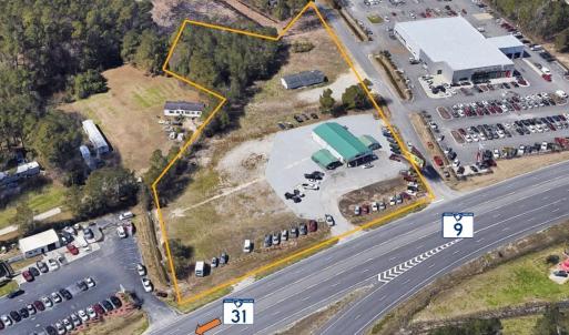 Aerial view of property's location featuring prope