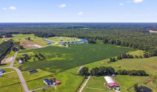 View of rural area featuring a forest and a nearby