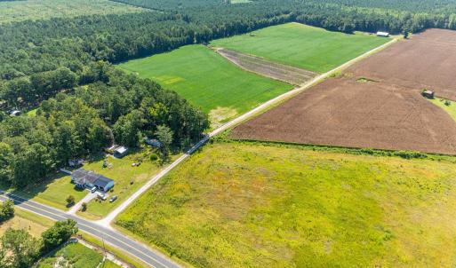 Aerial view of sparsely populated area featuring f