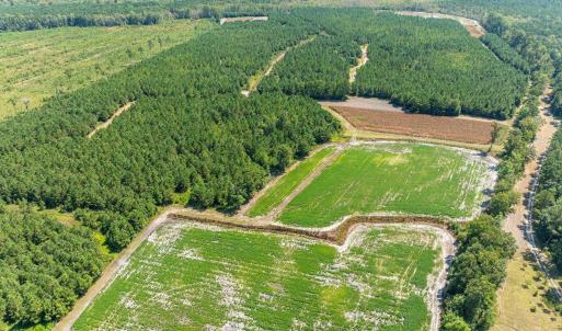 Aerial view of property and surrounding area with