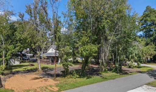 View of home's community featuring view of wooded