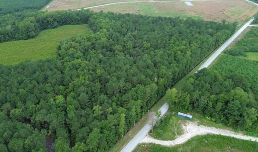Aerial view of property and surrounding area with