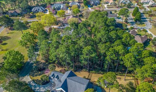 Aerial view of property and surrounding area with