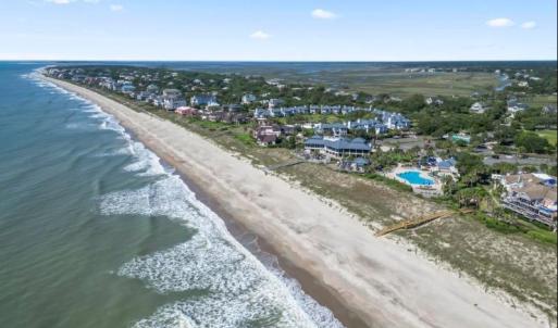 Aerial view of residential area with expansive bea