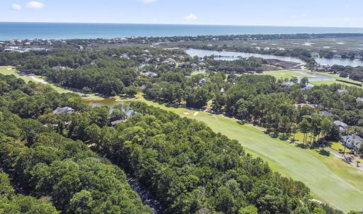 Aerial view of a large body of water and a golf co