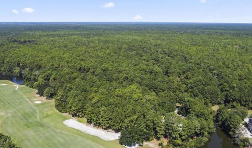 Aerial view of property and surrounding area with