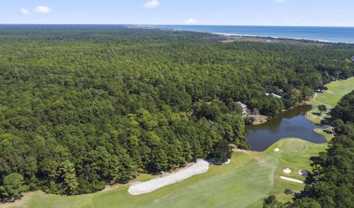 Aerial view of property and surrounding area with