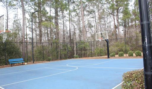 View of sport court featuring community basketball