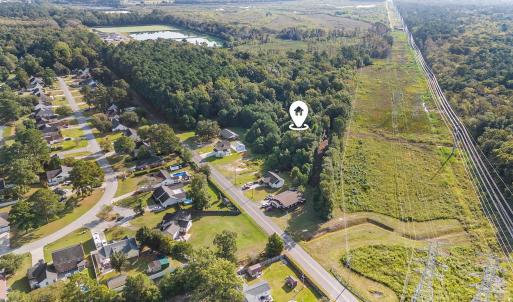 Aerial view of property and surrounding area featu