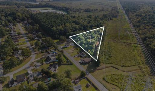 Aerial view of property's location featuring prope