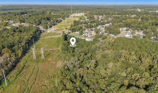Aerial view of property and surrounding area featu