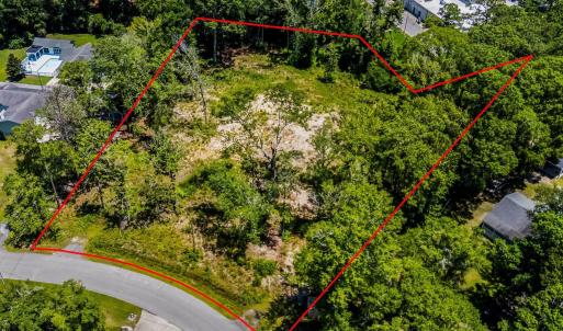 Aerial view of property and surrounding area with