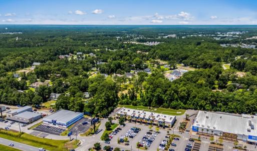 Aerial view of property and surrounding area featu