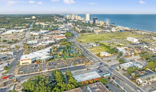 View of property location featuring nearby urban a