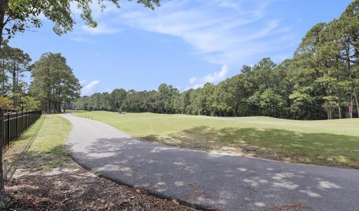 View the 12th Fairway from your new wooded residen